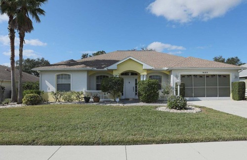 Regency Oaks House | Idyllic Lakefront Retreat with Private Pool at Regency Oaks