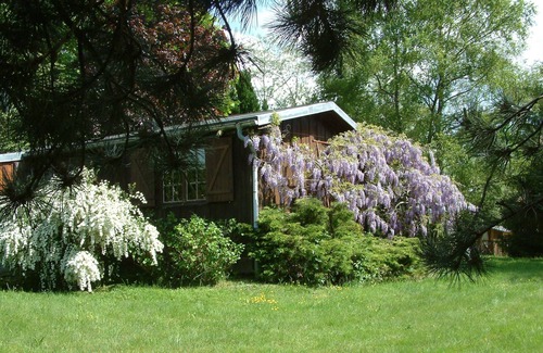 Valliere Ski Chalet | Inviting Chalet with Heated Pool and Scenic Wooded Grounds