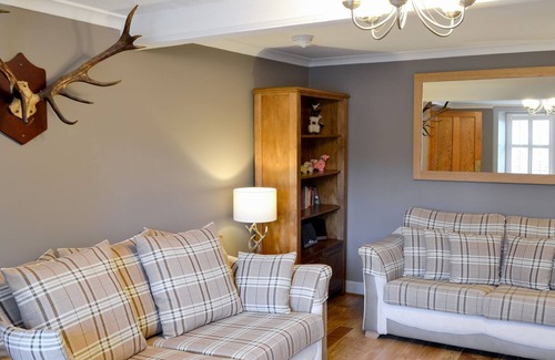 Newton Stewart Cottage | Detached property with a lovely garden leading down to the River Cree near Newton Stewart.