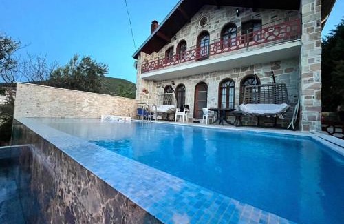 Burhaniye Villa | Detached Stone Villa with Pool Sleeps 9