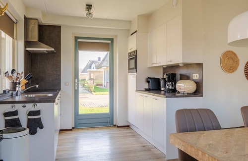 Julianadorp aan zee Villa | Inviting Villa with Sauna for 6 Near Family Attractions