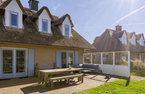 Julianadorp aan zee Villa | Inviting Villa with Sauna for 6 Near Family Attractions