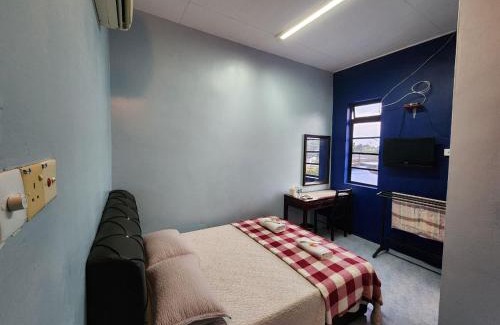 Kampung Janda Hotel | Family-Friendly Deummah Guest Room with Top Ratings