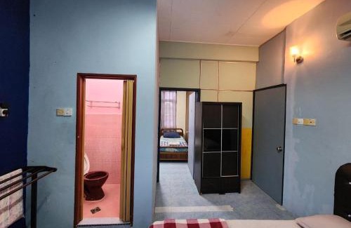 Kampung Janda Hotel | Family-Friendly Deummah Guest Room with Top Ratings