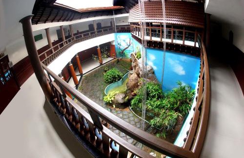 Chittilapilly Hotel | Devasura Inn: Pet-Friendly Comfort with Top Amenities