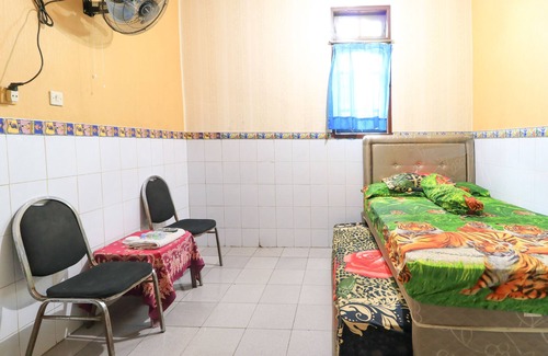 Bungurasih House | Cozy Dharmawati Homestay with Child-Friendly Amenities