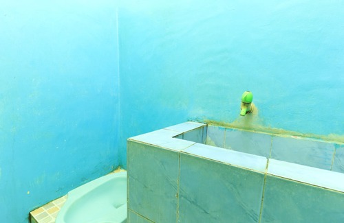 Bungurasih House | Cozy Dharmawati Homestay with Child-Friendly Amenities
