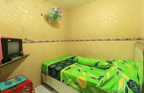 Bungurasih House | Discover Dharmawati Homestay: Family-Friendly Comfort