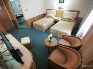 Nan Hotel | Discover Dhevaraj Hotel: Family-Friendly with Pool & Dining