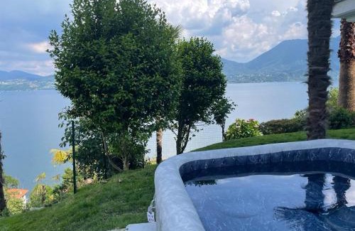 Oggebbio Villa | Relaxing Diana Villa: Oceanfront Escape with Hot Tub