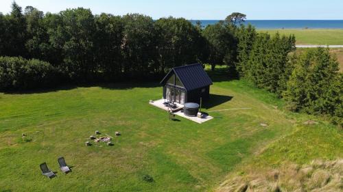 Pavilosta House | DIDAMM holiday cabin by the open sea in Strante