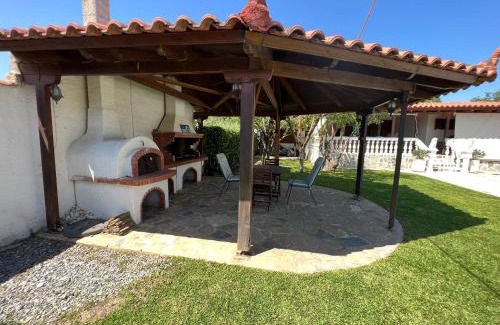 Eretria Villa | DIMIS Poolside Villa with Oceanfront Views & Guest Rated 10/10