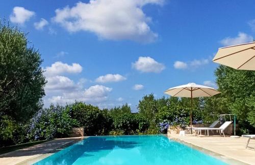 Cozzana Cabin | Discover Dimora&Pool Gerardo: Oceanfront Paradise Awaits