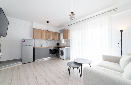 Ofrinion Villa | Two-Bedroom Duplex with Garden at Dionysos Complex