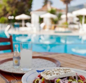 Skopelos Hotel | Beachfront Bliss at Dionyssos: Pool & Ocean Views Await