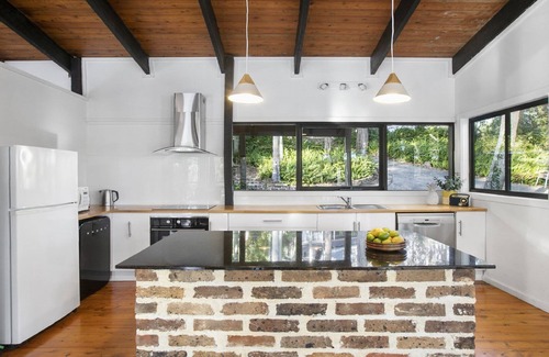 Copacabana House | Lakefront Retreat with Direct Beach Access and Great Amenities