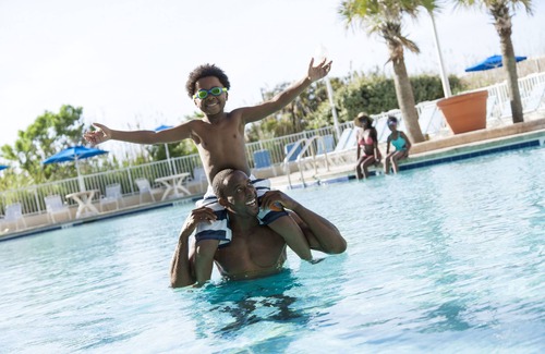 Arcadian Shores Resort | Oceanfront King Suite at Family Resort with Unique Amenities