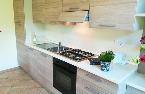 Idro Apartment | Idyllic Lakefront Retreat with Garden Access and Pool