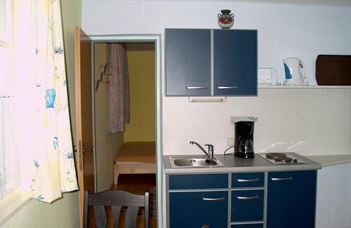 Weissenbach Apartment | Inviting Dirndl Apartment with Kitchen & Spa at Abenteuerhof Schiefer