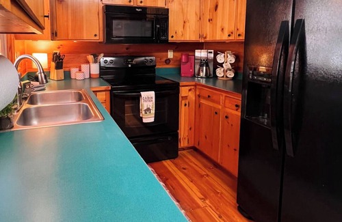 Hidden Lake Cabin | Discover tranquility at Hidden Oasis, a charming home nestled in serene Cherry Log Mountain