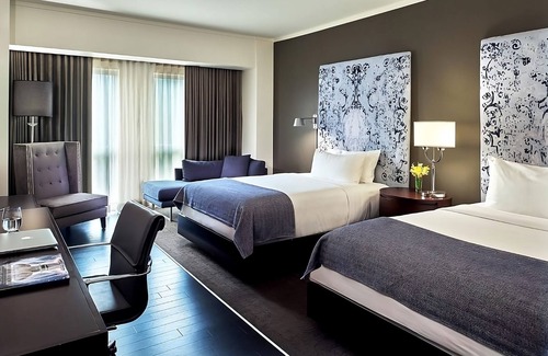 West Plaza Hotel | Explore Union Station: Family Units with Live Music & Pool