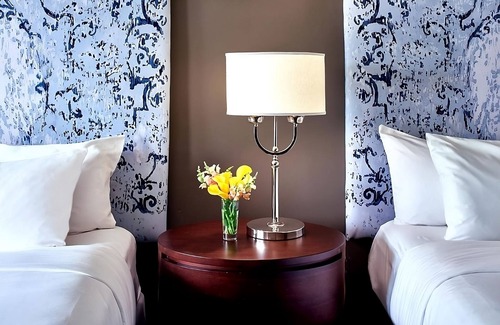 West Plaza Hotel | Explore Union Station: Family Units with Live Music & Pool