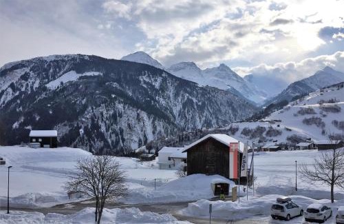 Acletta Apartment | Elegant Disentis Mountain View with Private Pool & Family Fun
