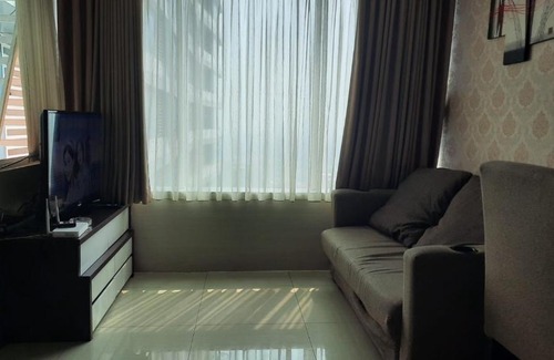 Pekayon Jaya Apartment | Cozy 1BR Retreat with Sofa Bed, WiFi & Pool Access