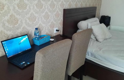 Pekayon Jaya Apartment | Cozy 1BR Retreat with Sofa Bed, WiFi & Pool Access
