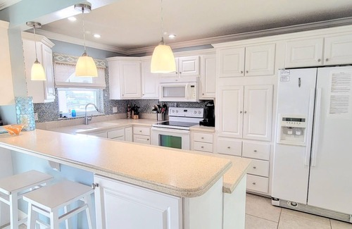 Cocoa Beach House | Experience Dolphin Cove Cocoa Beach: Heated Pool & Ocean Views