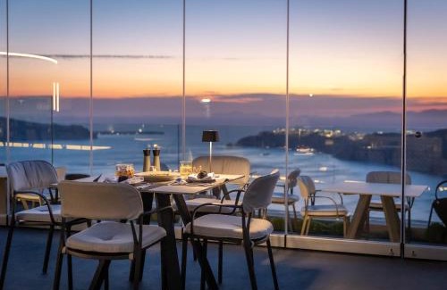 Imerovigli Hotel | Unforgettable Divine Cave Experience with Oceanfront Views