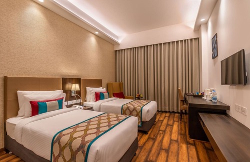 Kurukshetra Hotel | Exceptional Stays at Divine Clarks Inn Suites with Pool & Dining