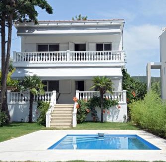 Toroni Villa | Experience Divine Villa: Family-Friendly with Ocean Views