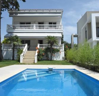 Toroni Villa | Experience Divine Villa: Family-Friendly with Ocean Views