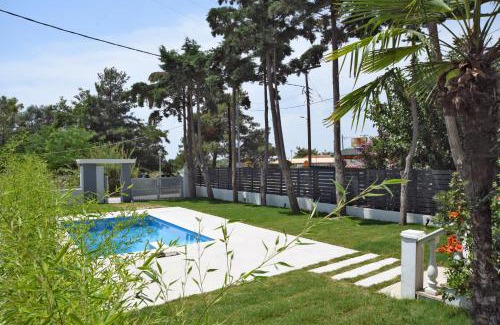 Toroni Villa | Experience Divine Villa: Family-Friendly with Ocean Views