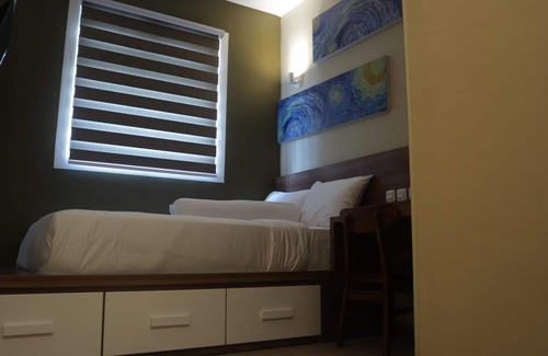 Palmerah House | Budget-Friendly Family Retreat at Djuragan Kamar Slipi