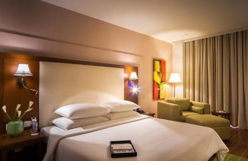 DLF Phase 5 Hotel | DLF City Club 5: Family-Friendly Retreat with Pool & Dining