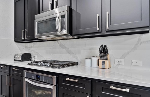 Little Elm House | Family-Friendly Hotel with Pool and Kitchen Amenities