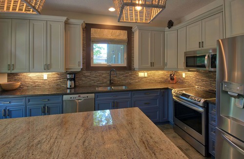 Grand Bend Cottage | Experience Dock Cottage: Waterfront Getaway with Hot Tub