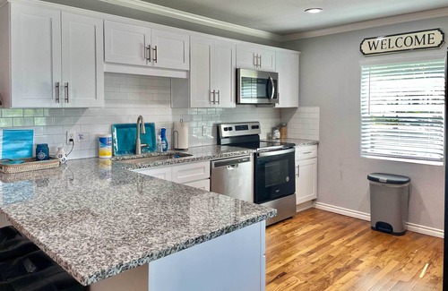 Enchanted Oaks House | Lakefront Cedar Creek Home with Dock & Cozy Fire Pit