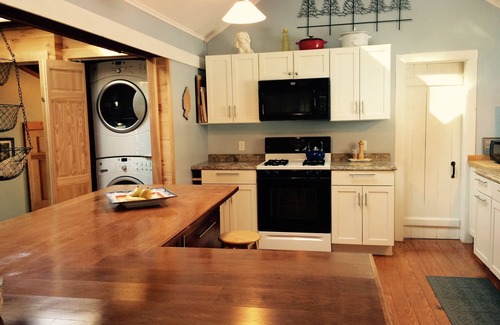 Monterey House | Relax at Dock on Lake Garfield with Pool and Spa Amenities