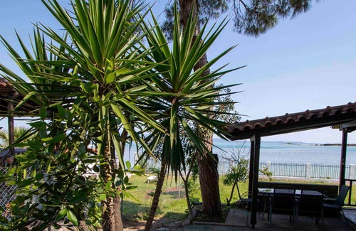 Vourvourou Villa | Docker BeachFront House: Oceanfront Getaway with Breakfast