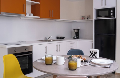 Irakleio Condo | Discover Comfort at Dodonis BLD with Family-Friendly Amenities