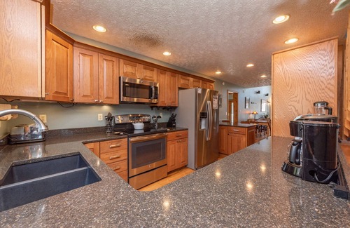 McHenry House | Majestic Lodge: Lakefront Retreat with Hot Tubs & Spa