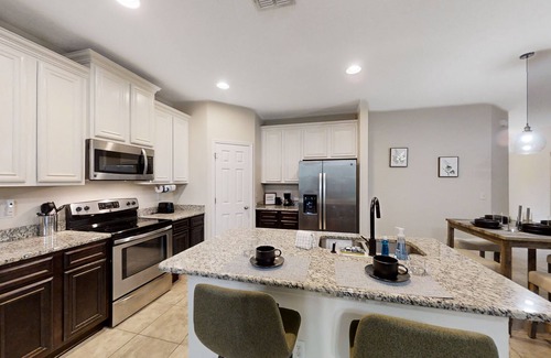 Westside House | Inviting Dog-Friendly Retreat with Screened Porch & Games