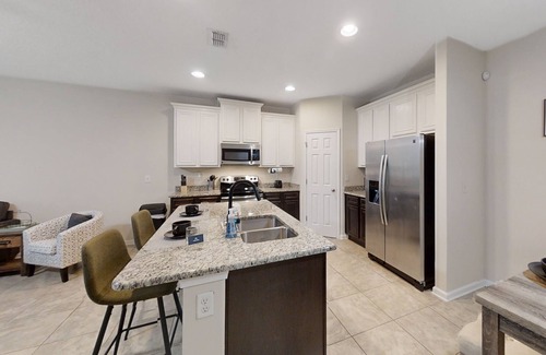 Westside House | Inviting Dog-Friendly Retreat with Screened Porch & Games