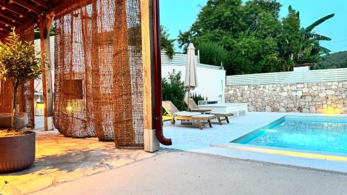 Dol Villa | Experience Dolce Terra: Oceanfront Bliss Rated 9.8/10