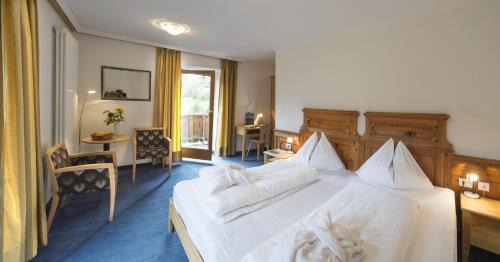 San Cipriano Hotel | Discover Dolomitenhotel Weisslahnbad: 9/10 Guest Rated Stay