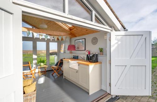 Burnham Deepdale House | Pet-Friendly Dolphin Cottage at Brancaster Staithe
