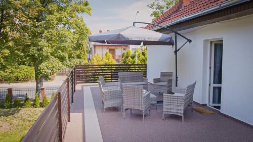 Osno Lubuskie Villa | Oceanfront Escape at Dom Jeziorna Perla - Rated 9.4/10!